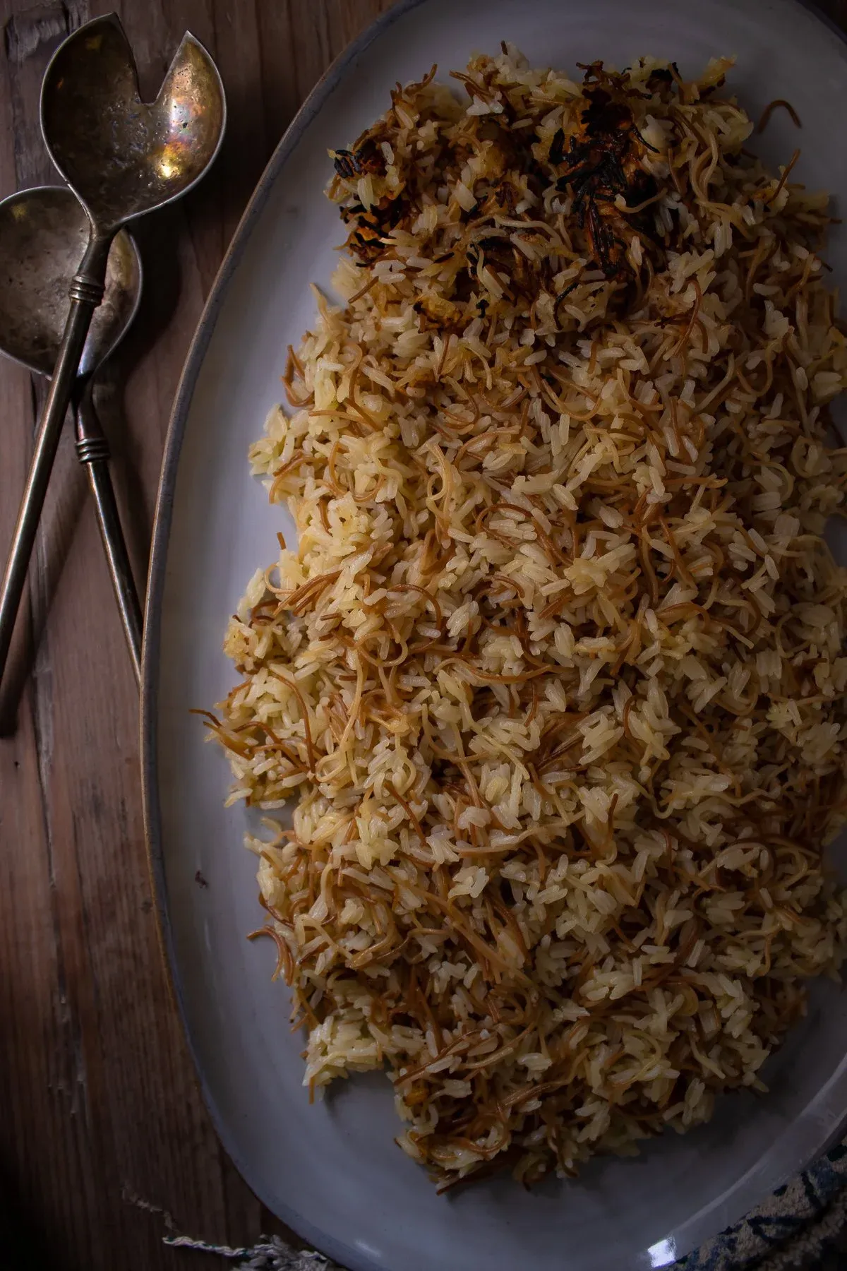 Overhead shot of Arroz con Fideos heaped on a grey oval serving platter