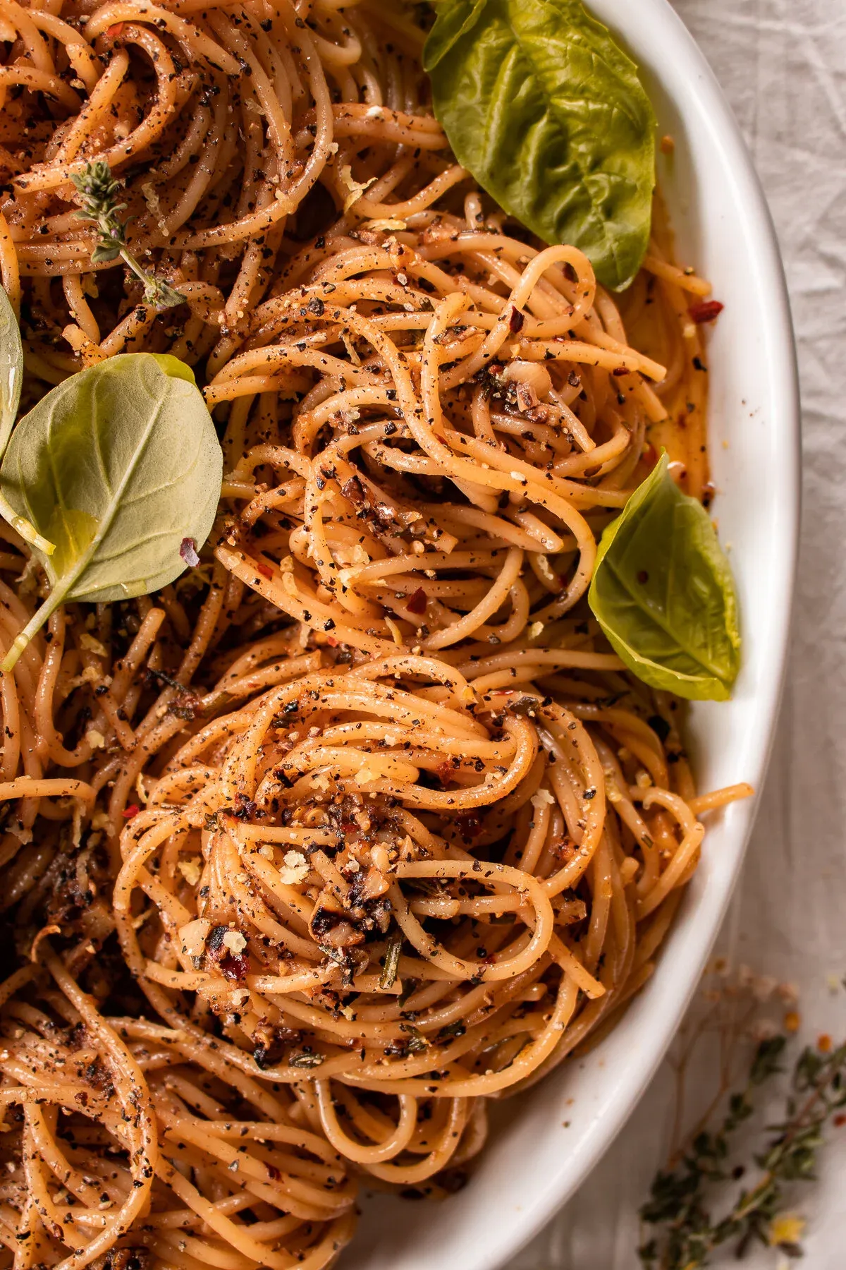 Close overhead shot of the lemon pepper spaghetti before plating the chicken