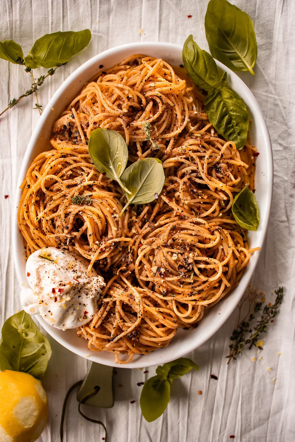 Elevated overhead angle of the finished lemon pepper chicken pasta serving dish