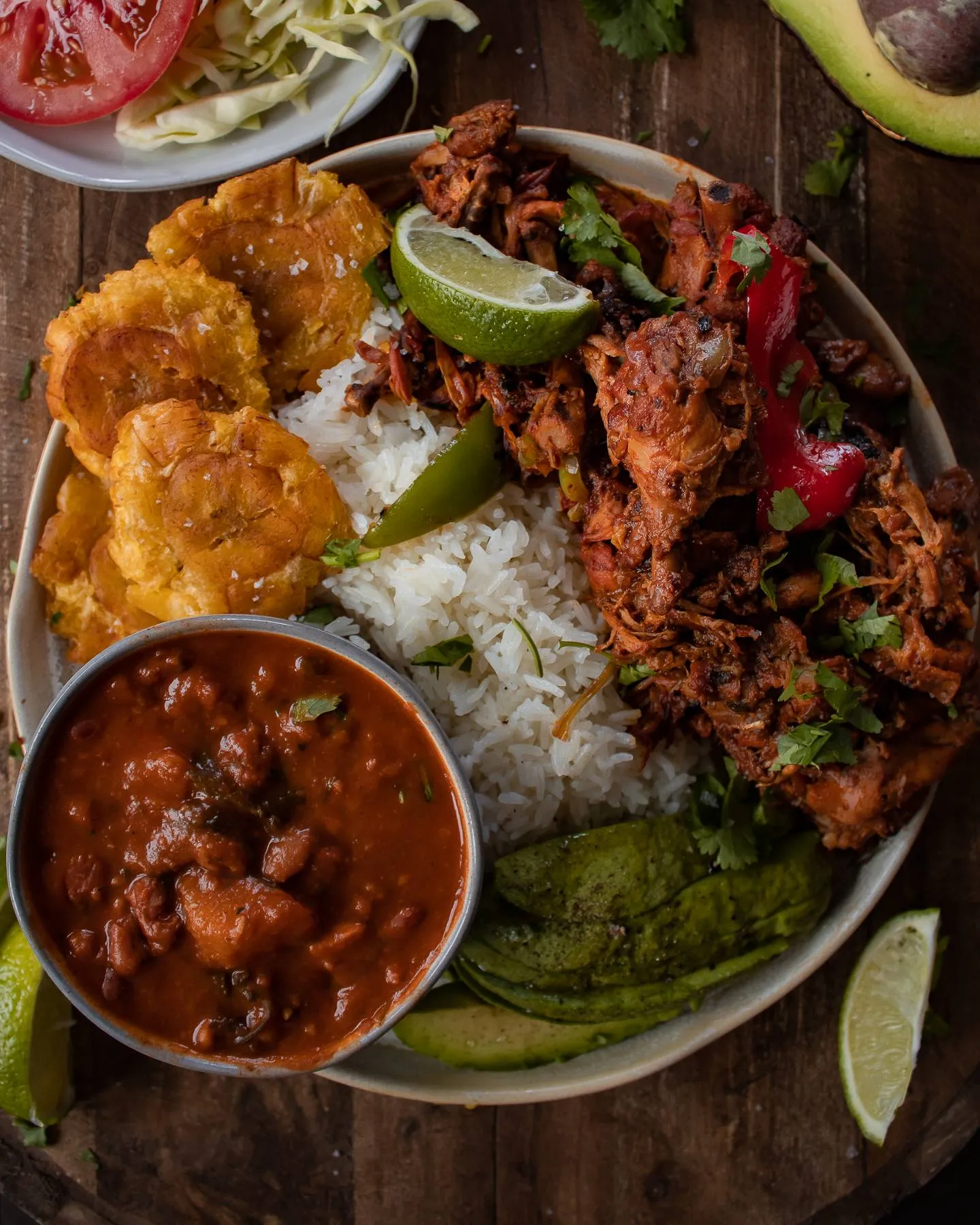 La Bandera Dominicana traditional Dominican lunch in a wide ceramic bowl — fluffy white rice