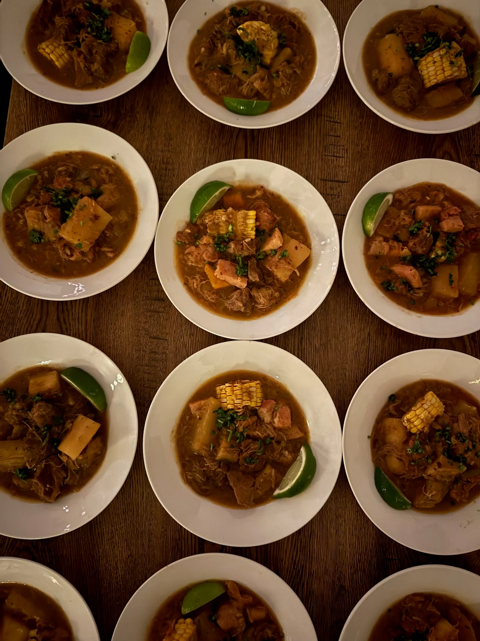 A table filled with plated dishes ready for service